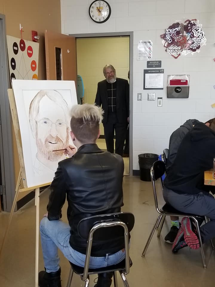 Paolo DeMaria engaging with students in a gifted classroom. 